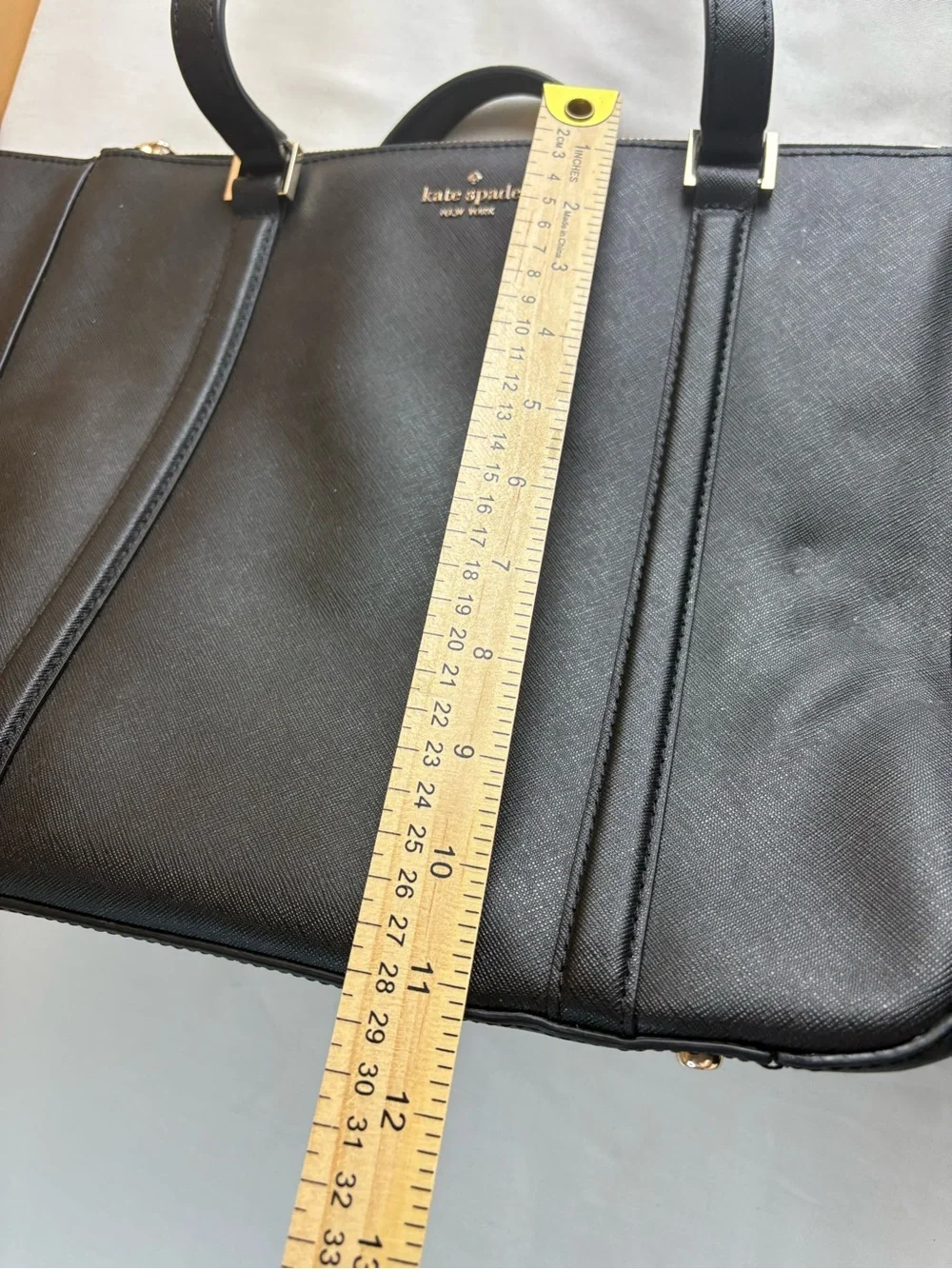 kate spade black structured Saffiano tote with gold logo